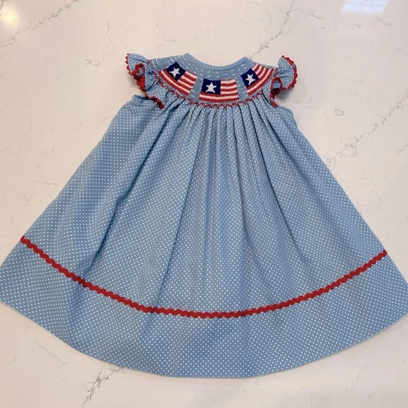 white christmas dresses Shine Like A Pearl Yellow Smocked Dress by Classic Whimsy - Girls Dresses main image 1
